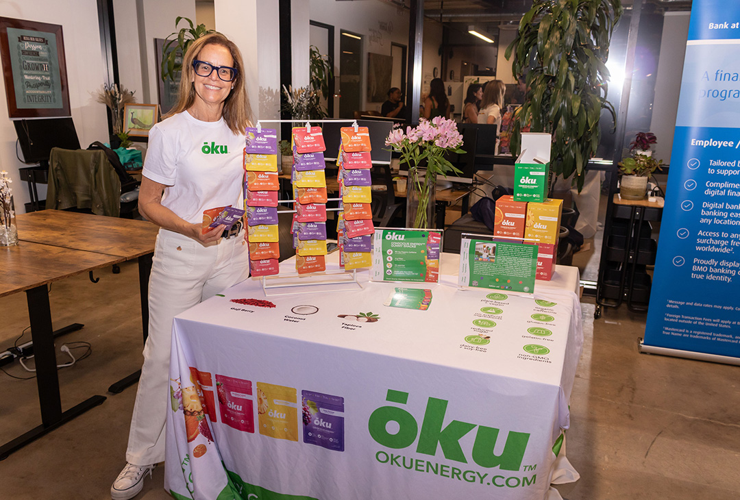 Oku Founder and Products Oku founder with products display